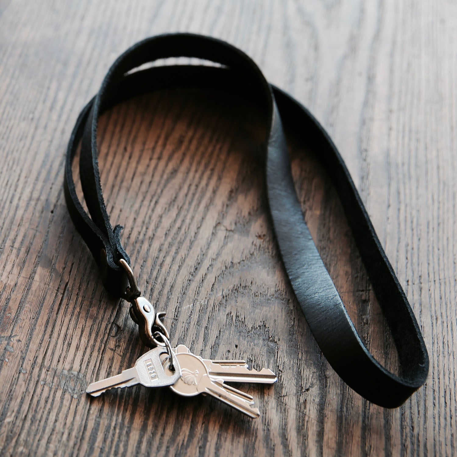 Fine brown leather lanyard or keychain with swivel clip and personalized name from Holtz Leather Co in Huntsville, Alabama