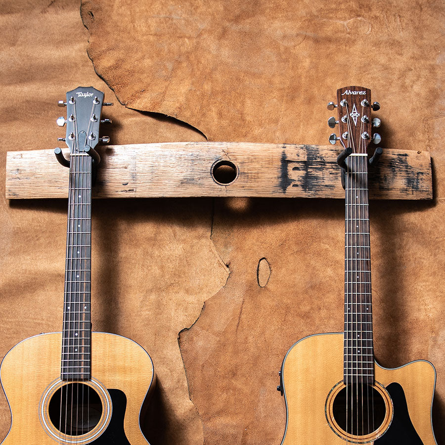 Double guitar holder made of Tennessee Whiskey Barrel wood with bunghole