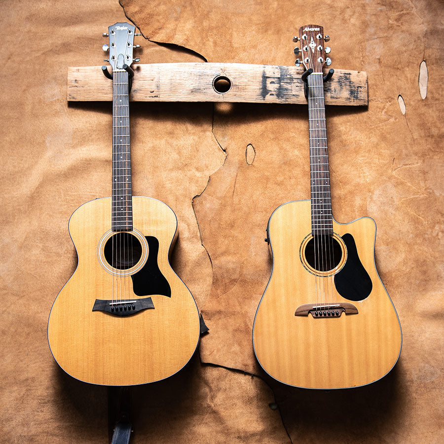 Double guitar holder made of Tennessee Whiskey Barrel wood with bunghole